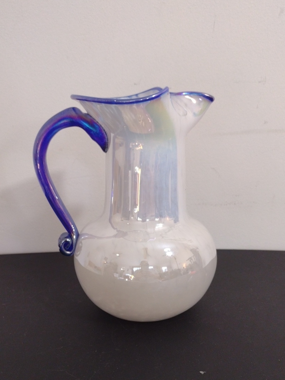 Iridescent White Glass Pitcher with Blue Accent Handle